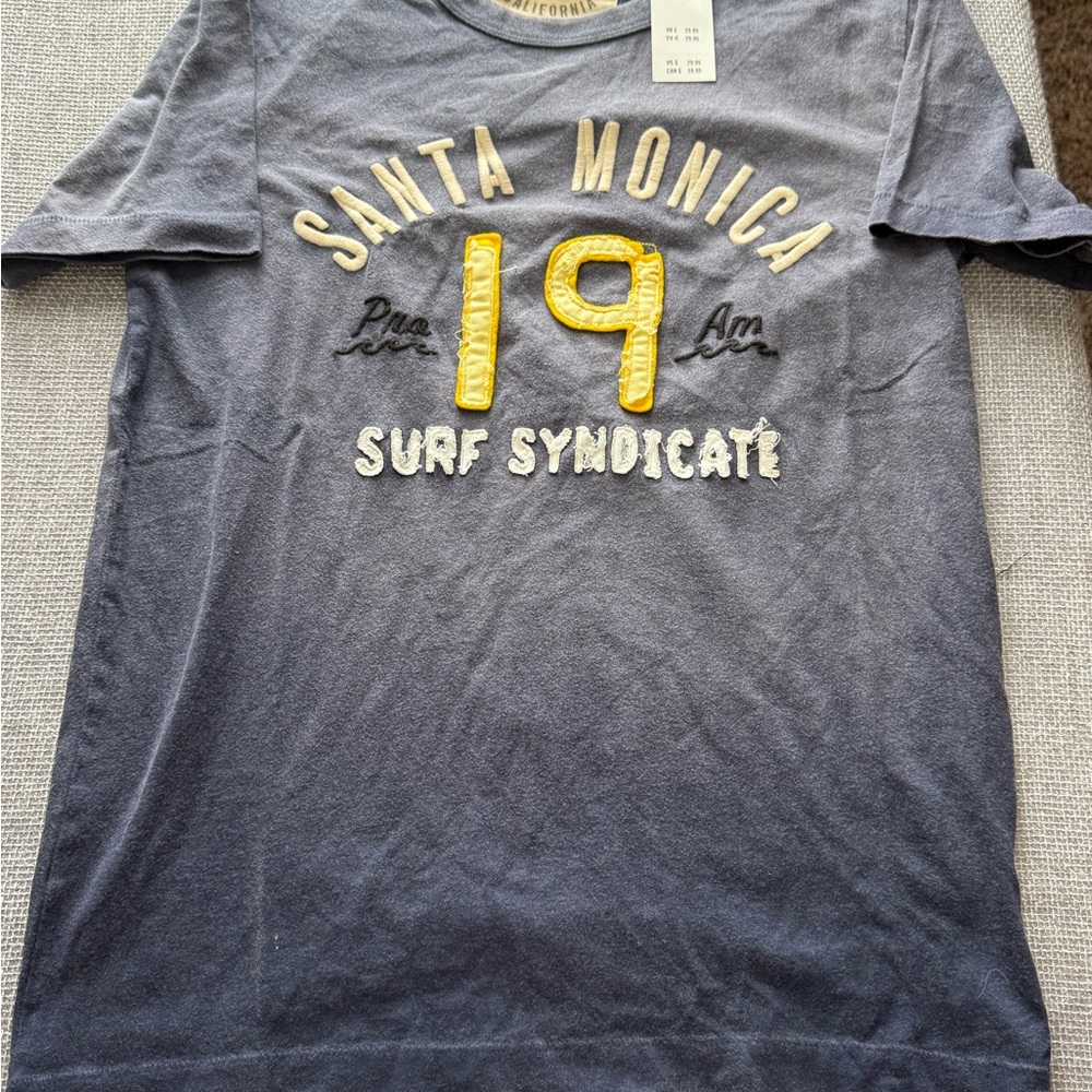 Hollister Blue Tee with Yellow Lettering